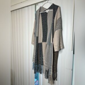 Woman’s knitted flowy cardigan